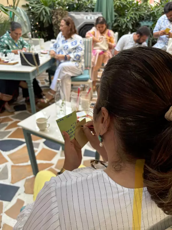 Participants listening to poetry recitations at Barish — In the Language of Rain event