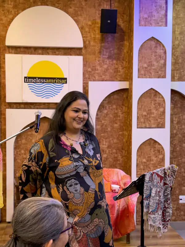 Saloni Poddar hosting and performing on stage at Siyahi’s Aunty Please literary event in Amritsar