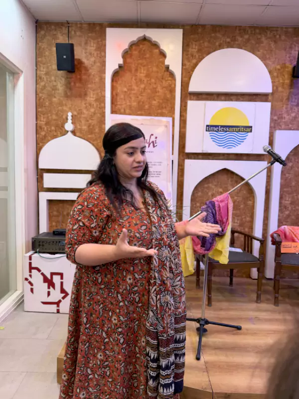 Woman presenting her personal story on stage during the Aunty Please literary gathering by Siyahi in Amritsar